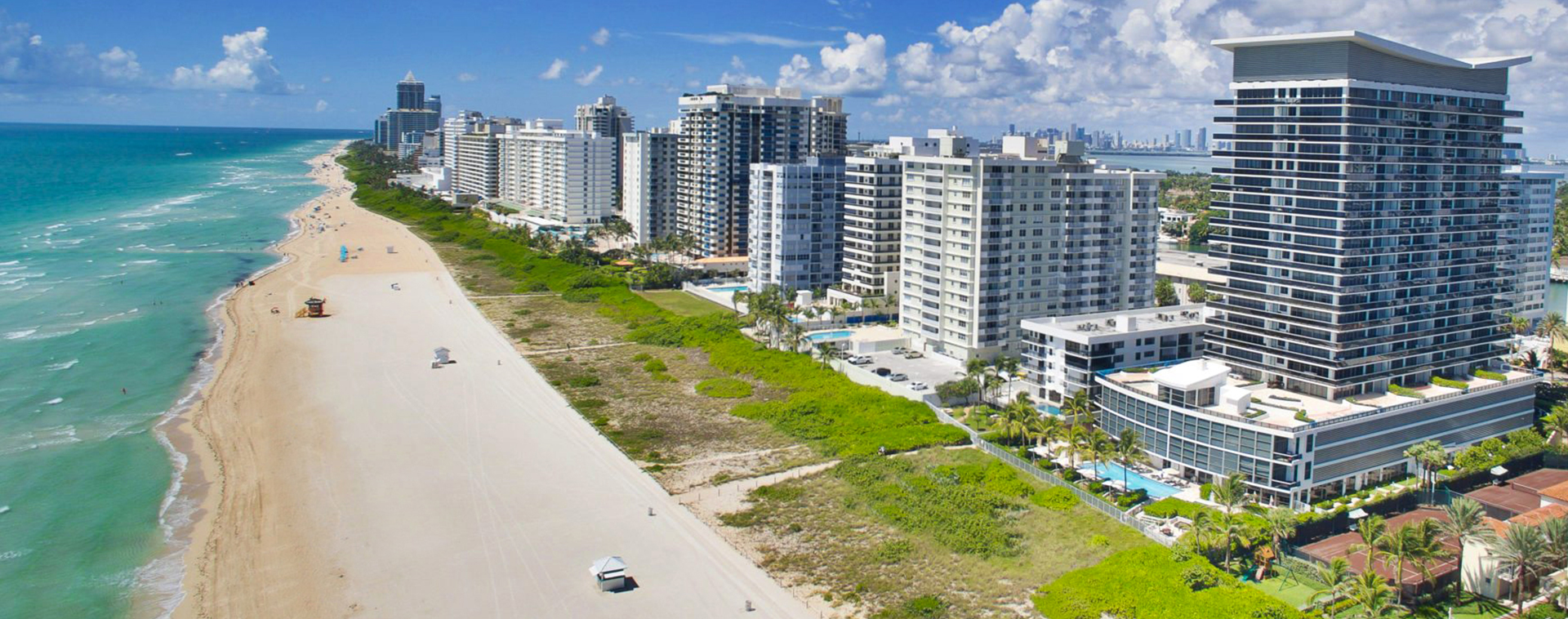 aerial image of condos on beachfront